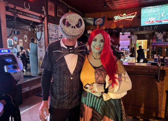 Customers in Halloween costumes